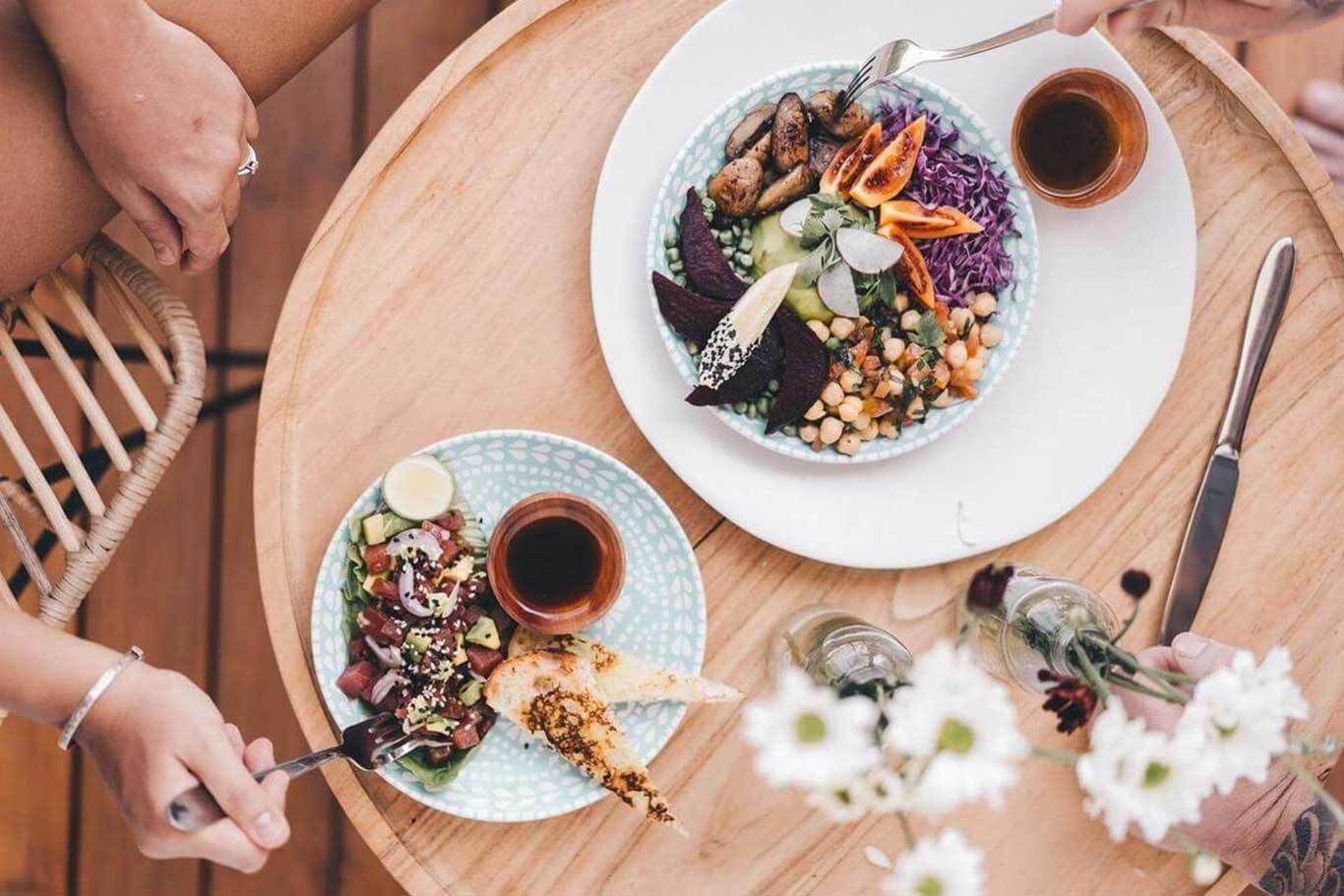Plated dishes served at Eat Me Cafe at Alternative Beach