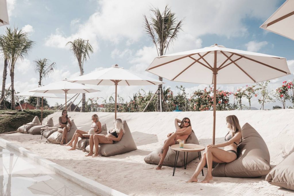 Poolside beanbags and daybeds at Alternative Beach