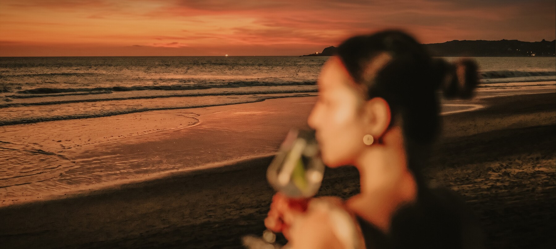 An evening drink overlooking the sea
