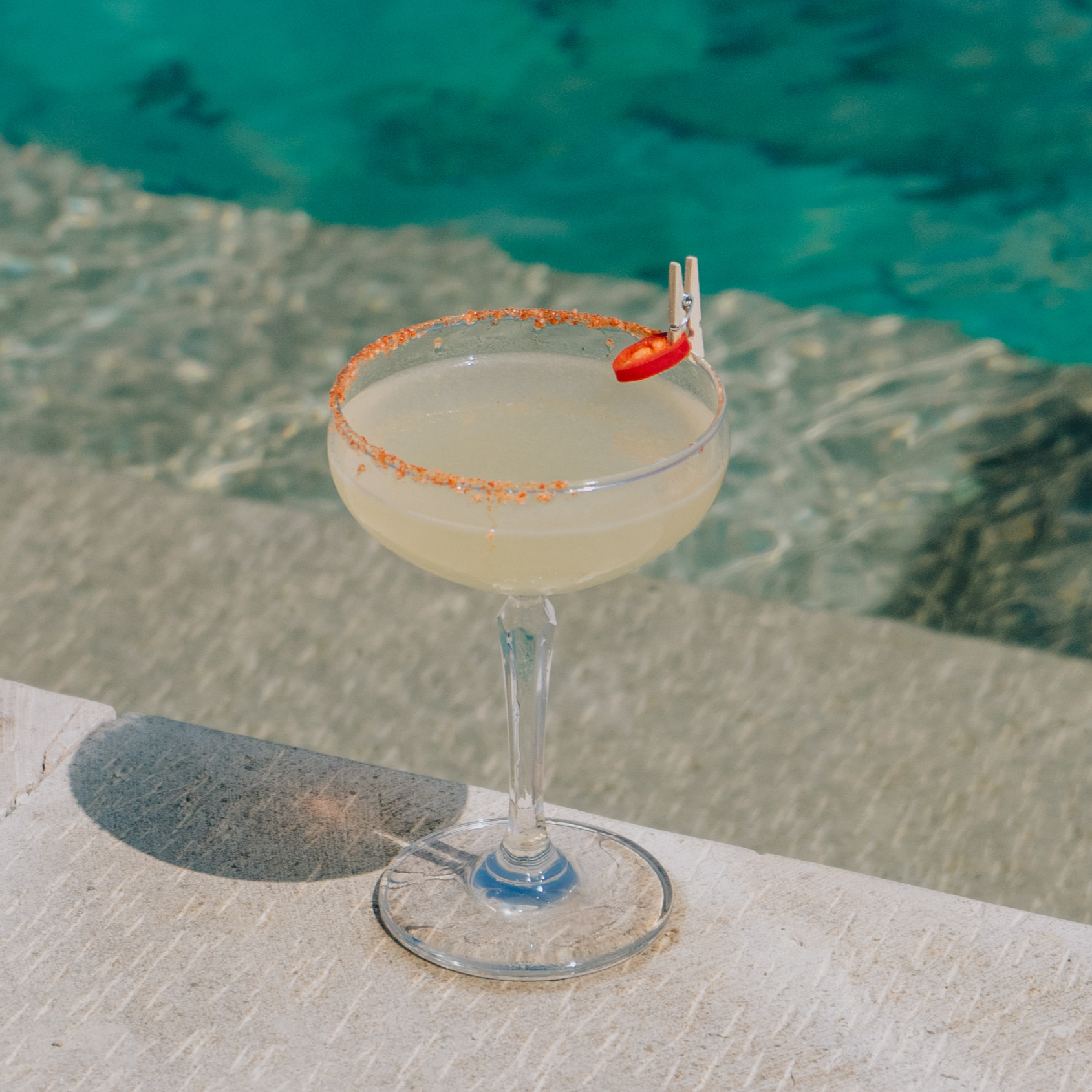 Cocktail by the water at ARNA Ocean Lounge