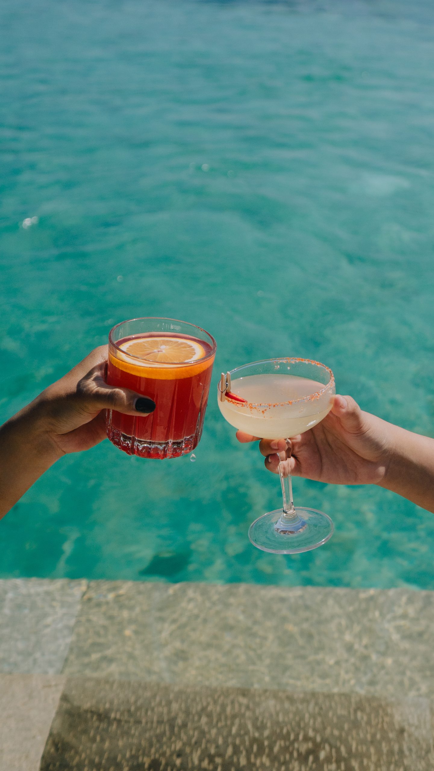 Drinks in the infinity pool at ARNA Ocean Lounge