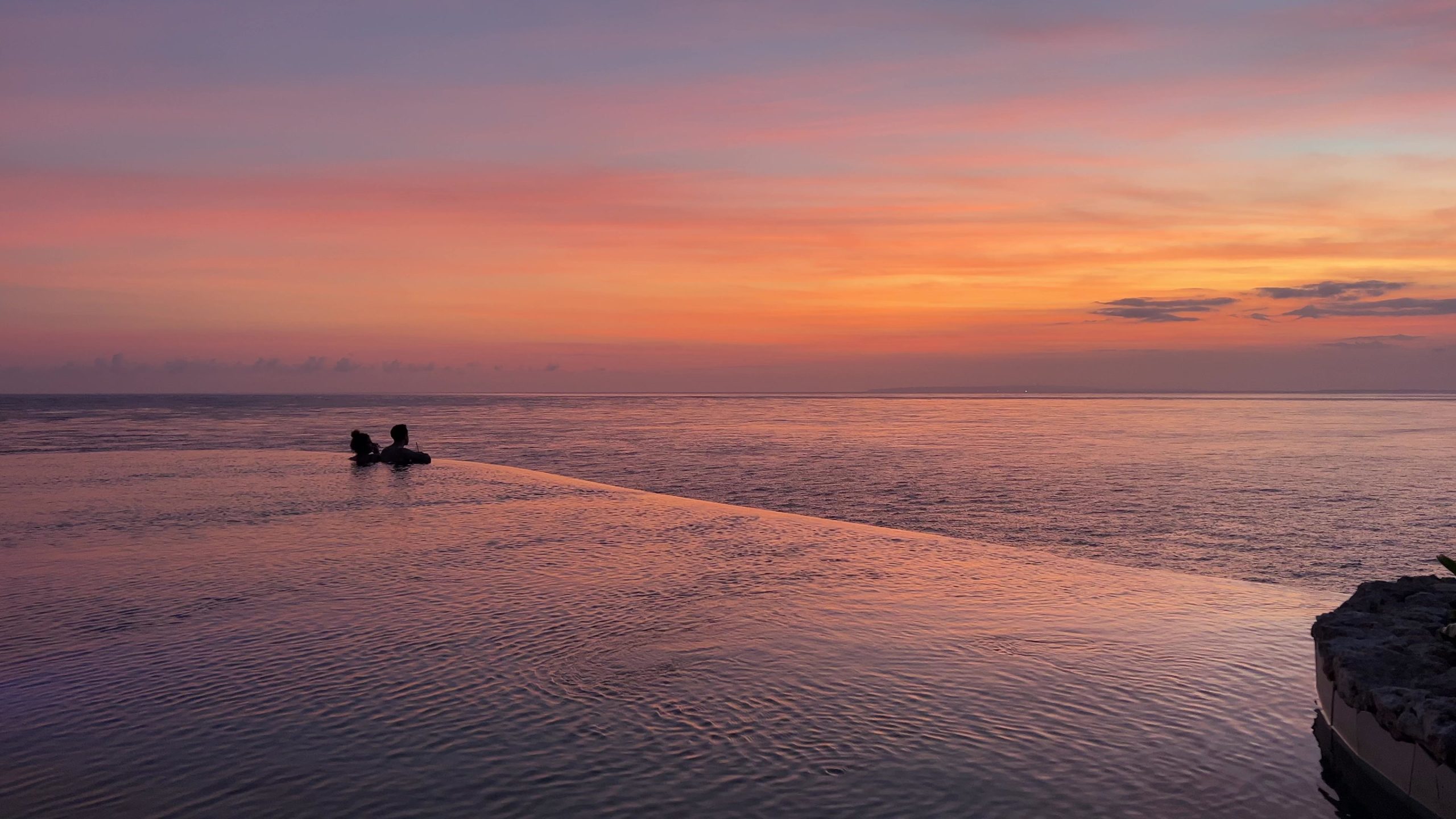 ARNA Ocean Lounge infinity pool at sunset