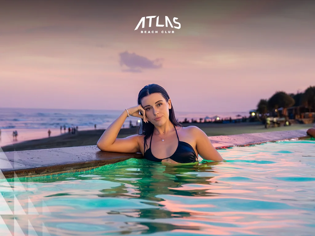 Atlas Beach Club — Pool overlooking the sea at dusk