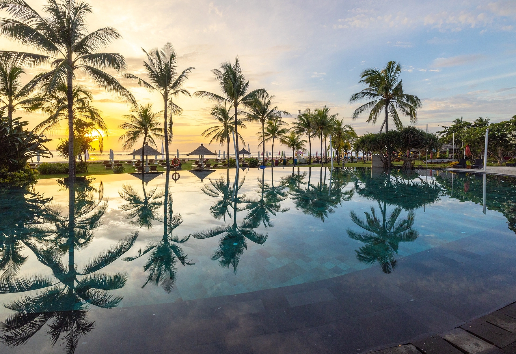 Morning light reflected in the infinity pool
