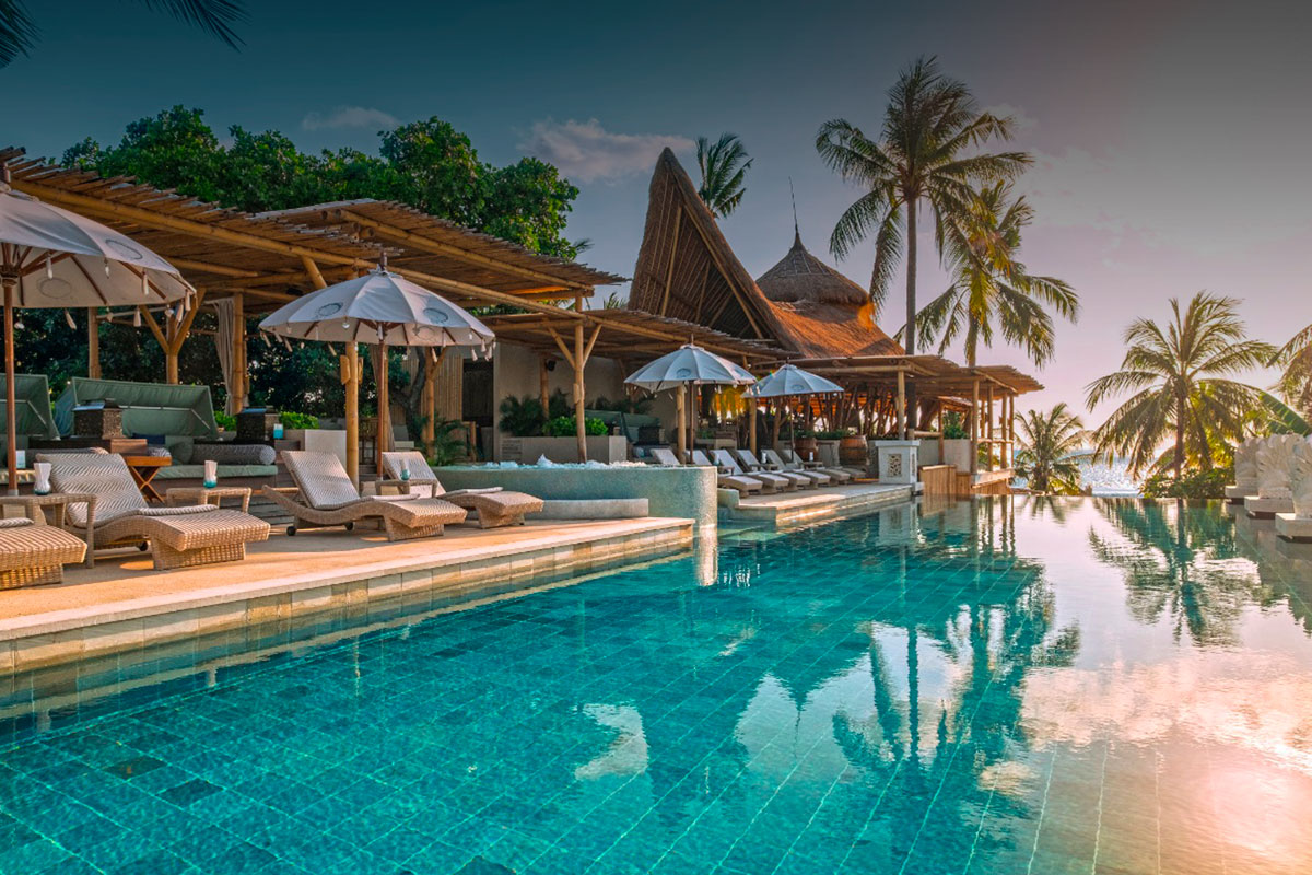 Azul Beach Club — Infinity pool at dusk