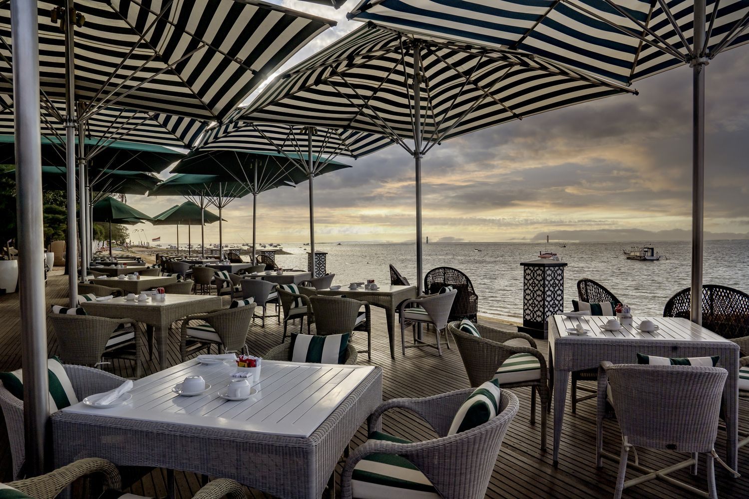 Breezy terrace seating at Beach Club Restaurant Sanur