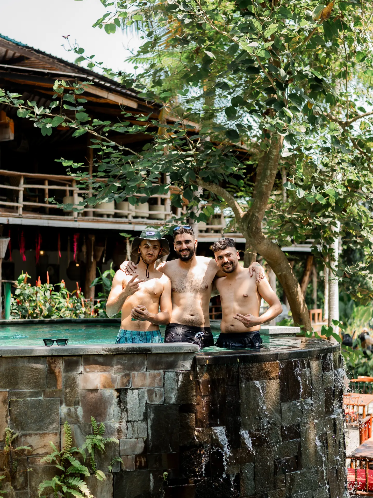 River club atmosphere with timber buildings and greenery