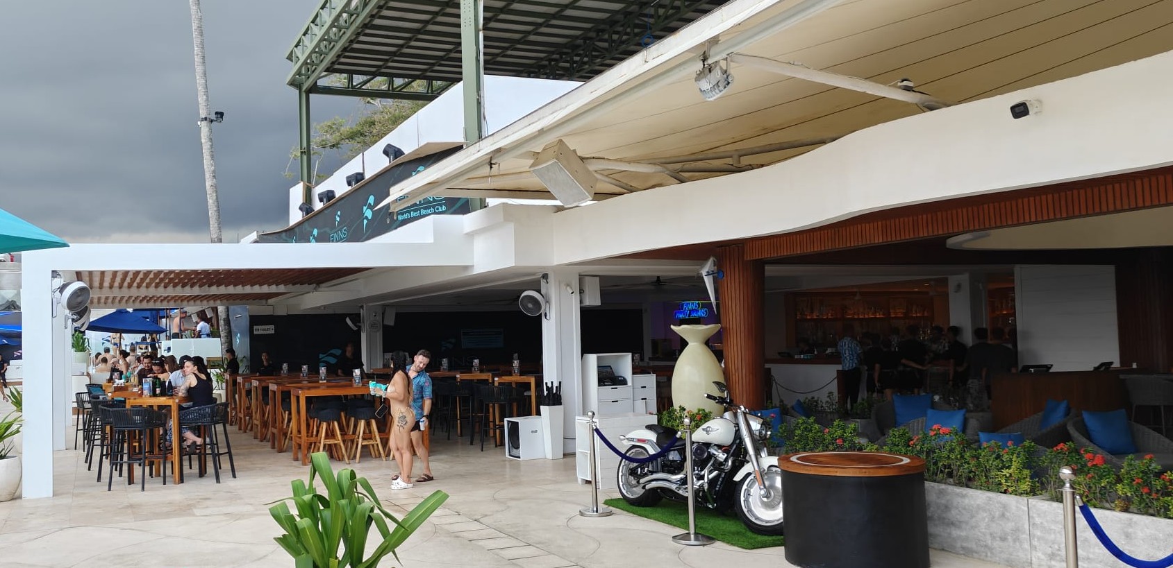 Bar counter with the ocean behind it
