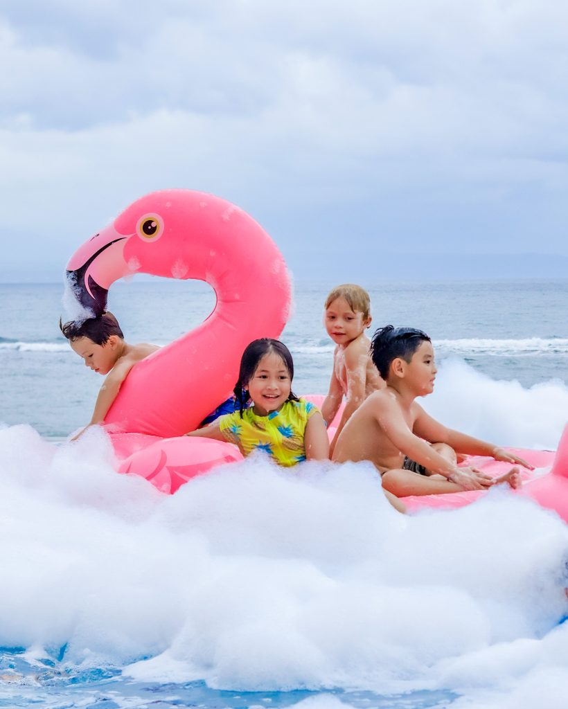 Flamingo Beach Club Bali — Pool play with a flamingo float