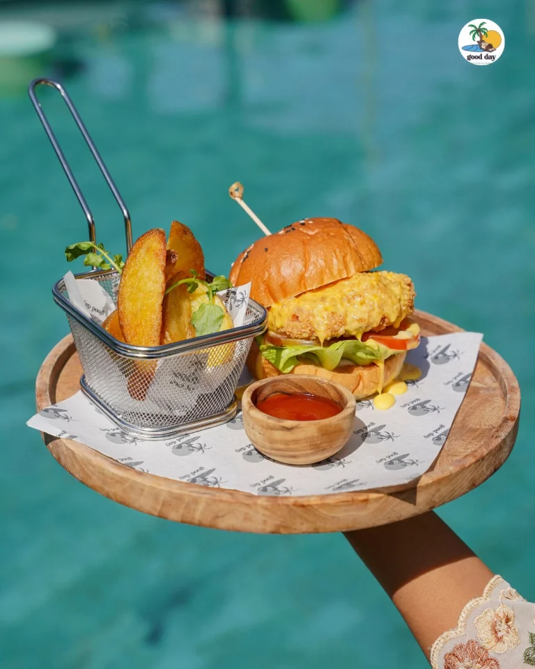 Burger meal beside the pool at Good Day Ubud