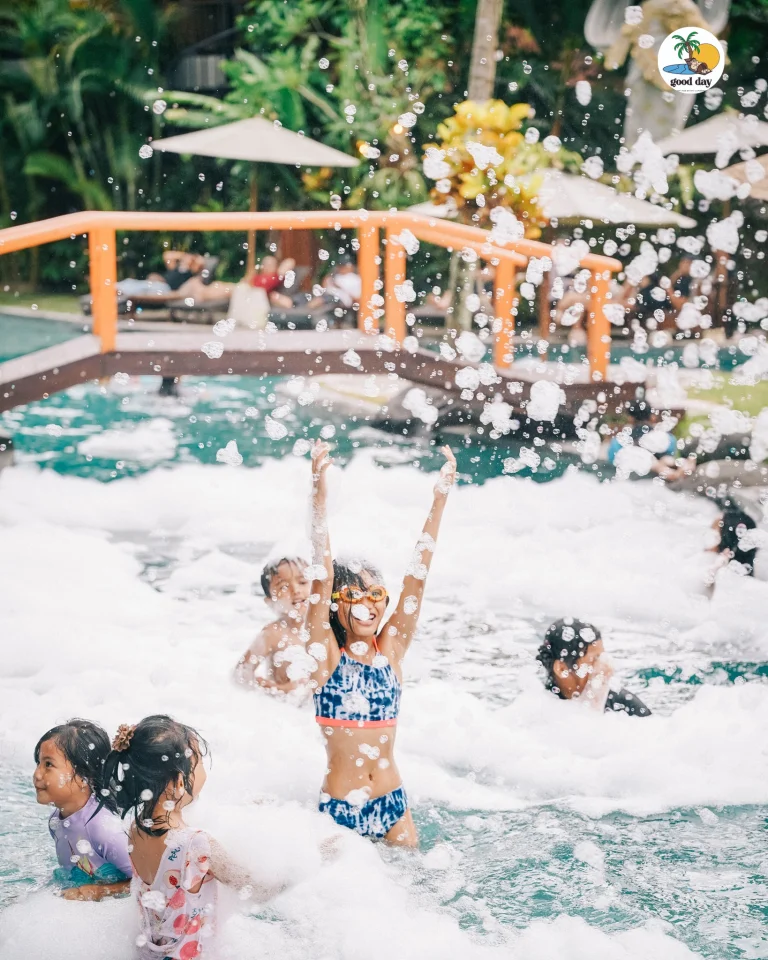 Daytime foam pool activity at Good Day Ubud
