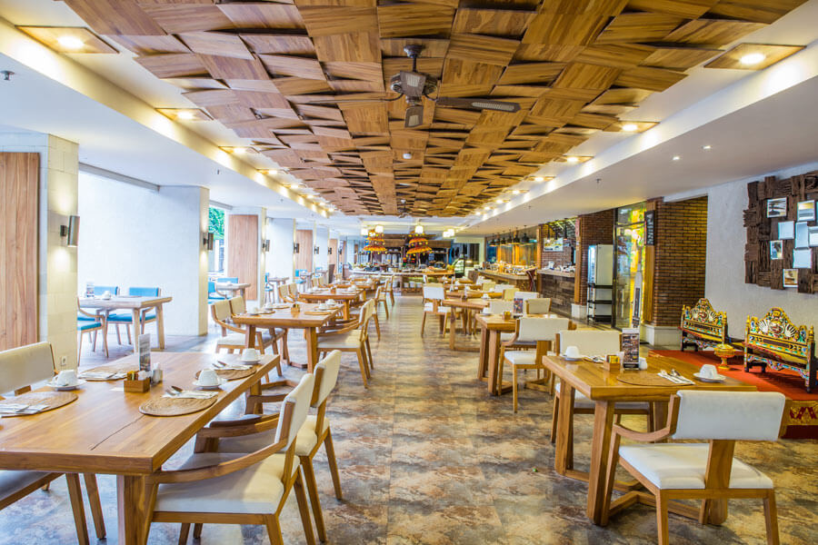 HIU dining room beneath its patterned timber ceiling