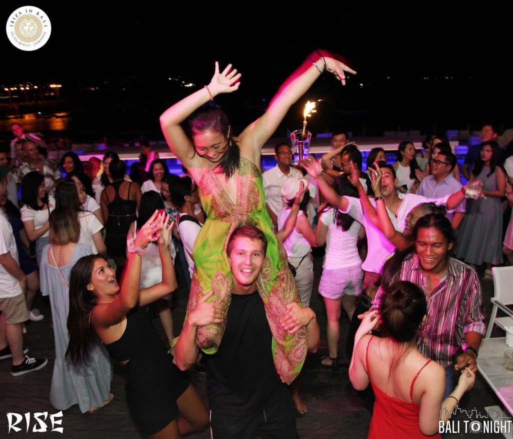 A party scene in colourful light