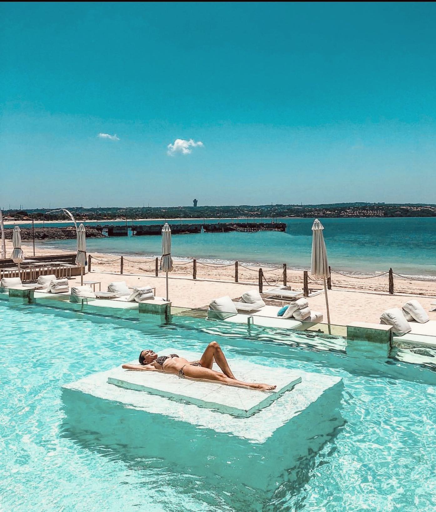 Ocean-facing pool area at Ibiza In Bali Beach Club