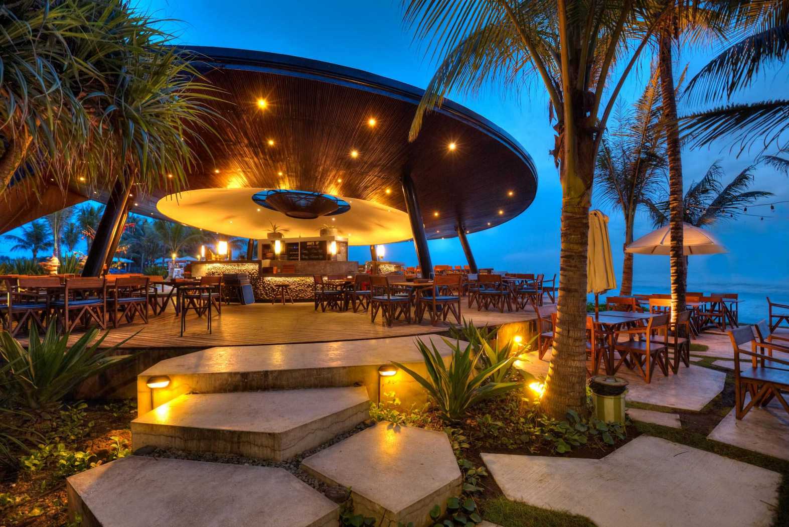 Komune Beach Club Keramas — Illuminated club building