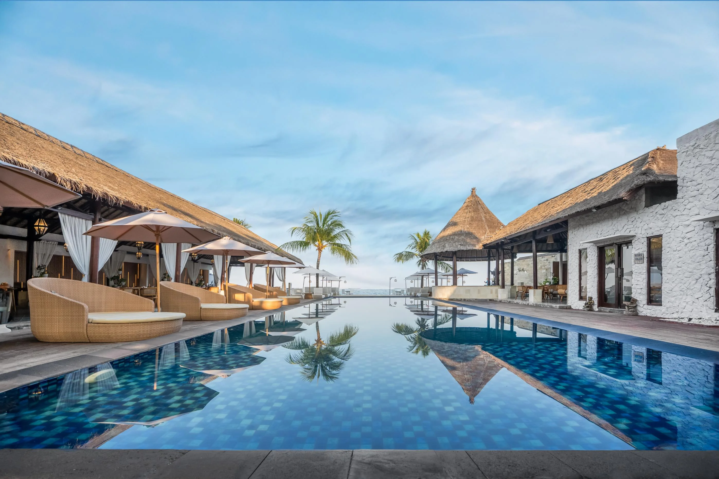Wide view of the pool, dining pavilion and sea at Lembongan Beach Club & Resort