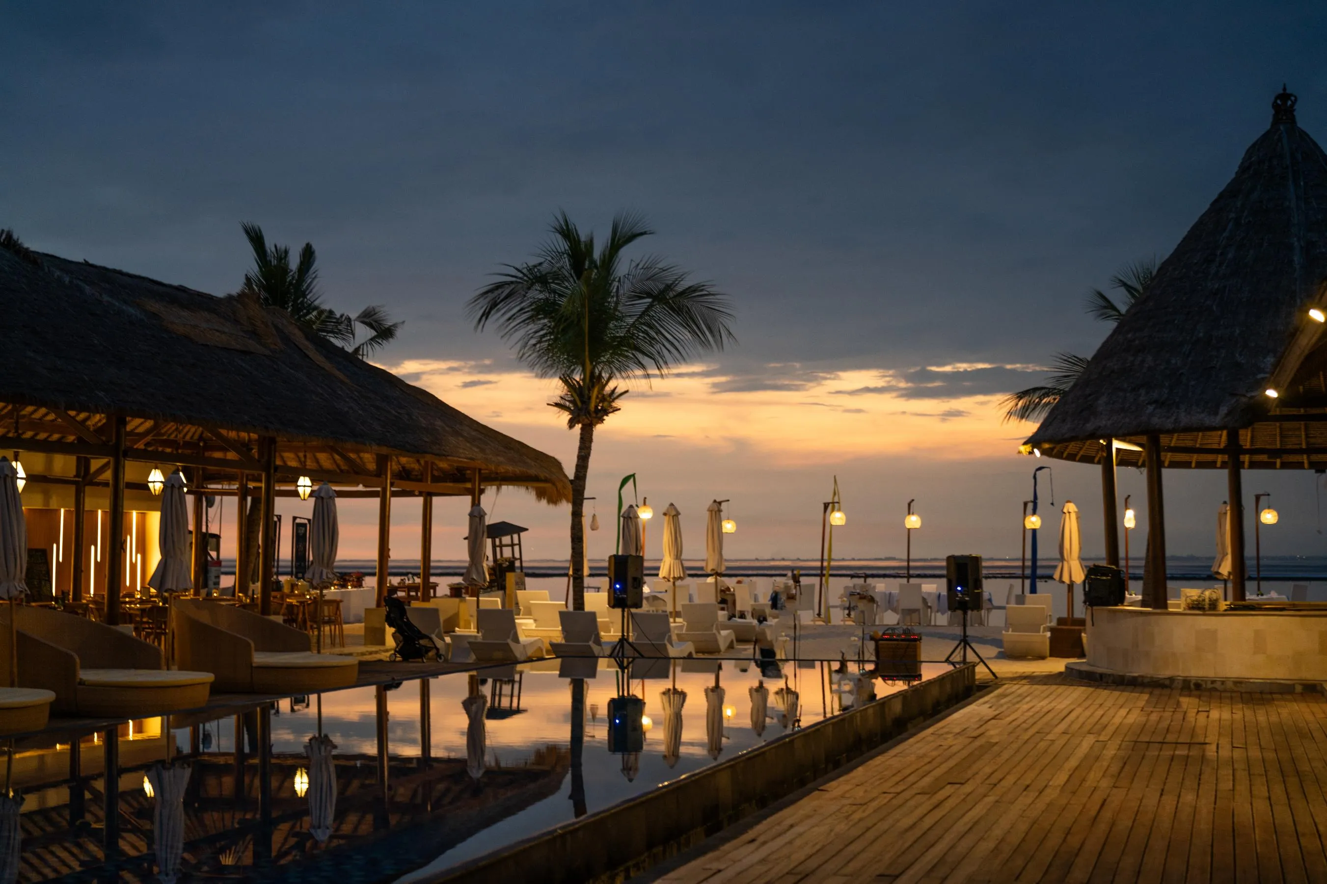 Beachfront dining pavilion at sunset at Lembongan Beach Club & Resort