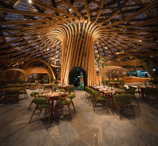Luna Beach Club — Illuminated bamboo dining at night