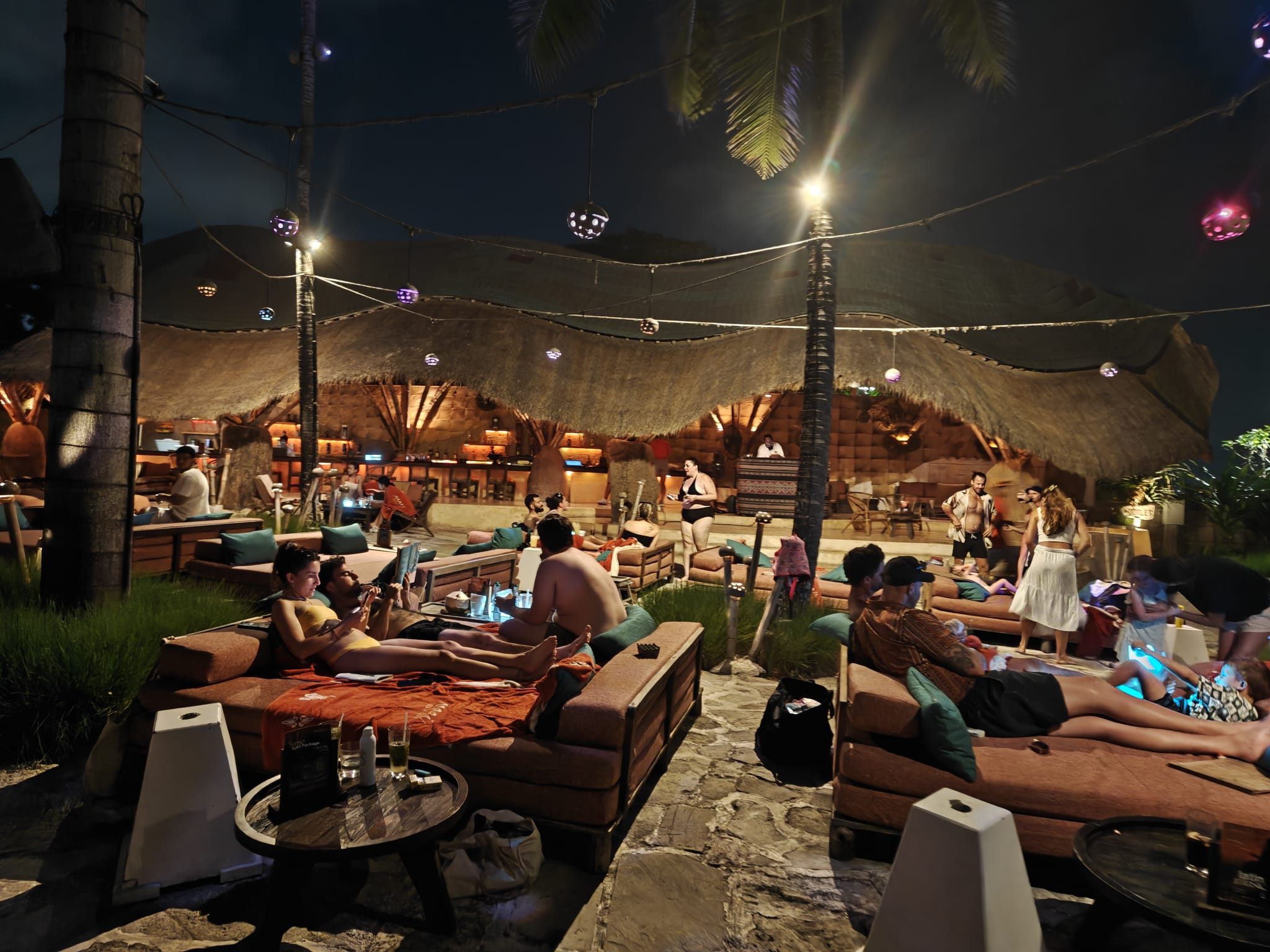 Daytime pool or beach scene at Mari Beach Club.