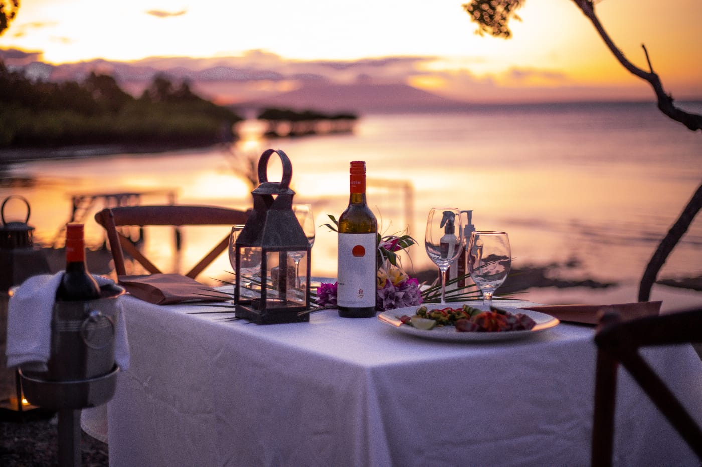Dining by the sea at sunset