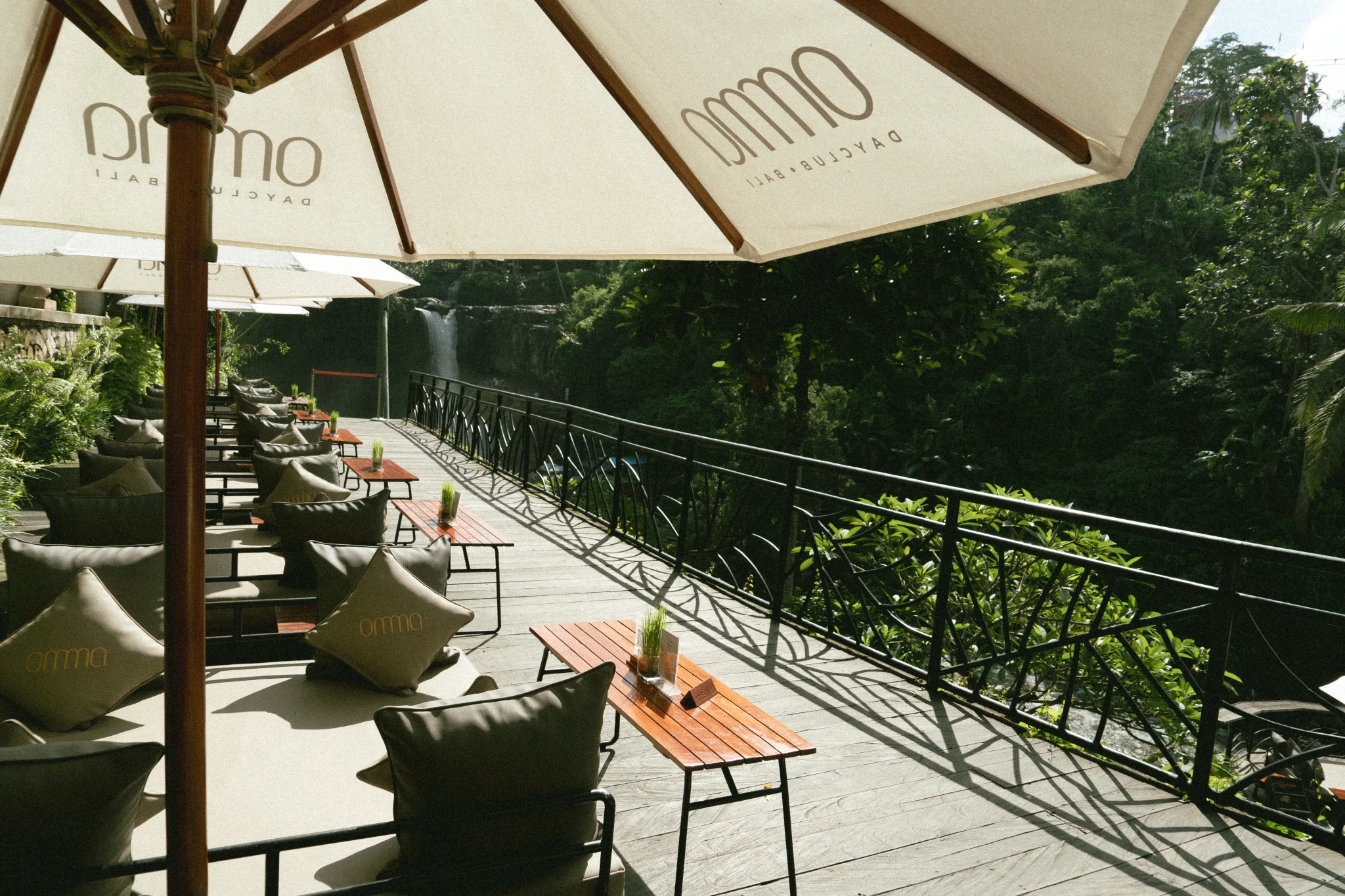 OMMA Dayclub seating by the water and waterfall