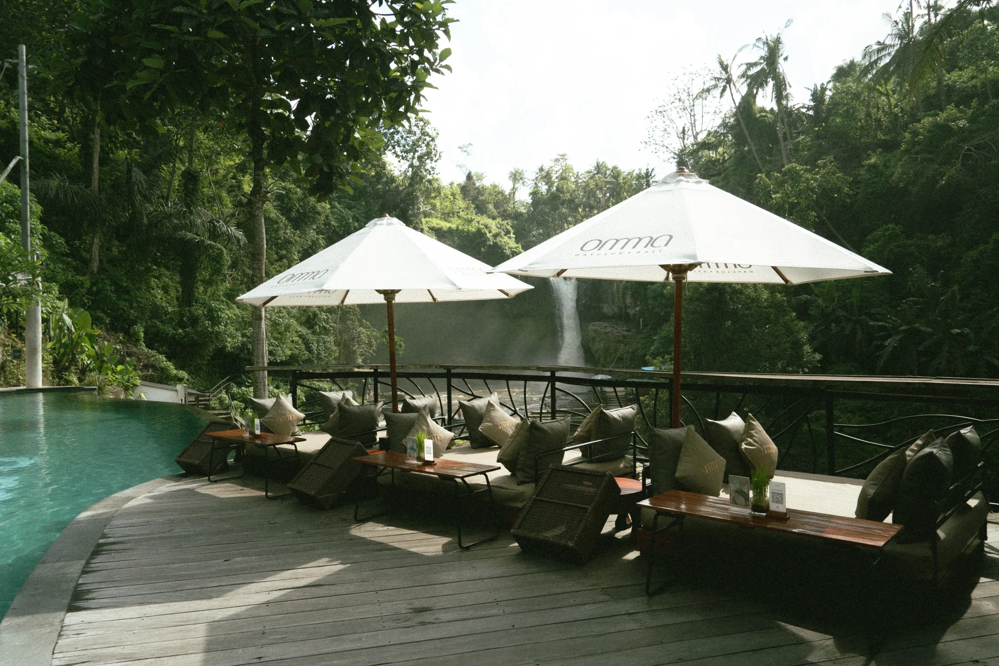 OMMA Dayclub poolside with Tegenungan waterfall view