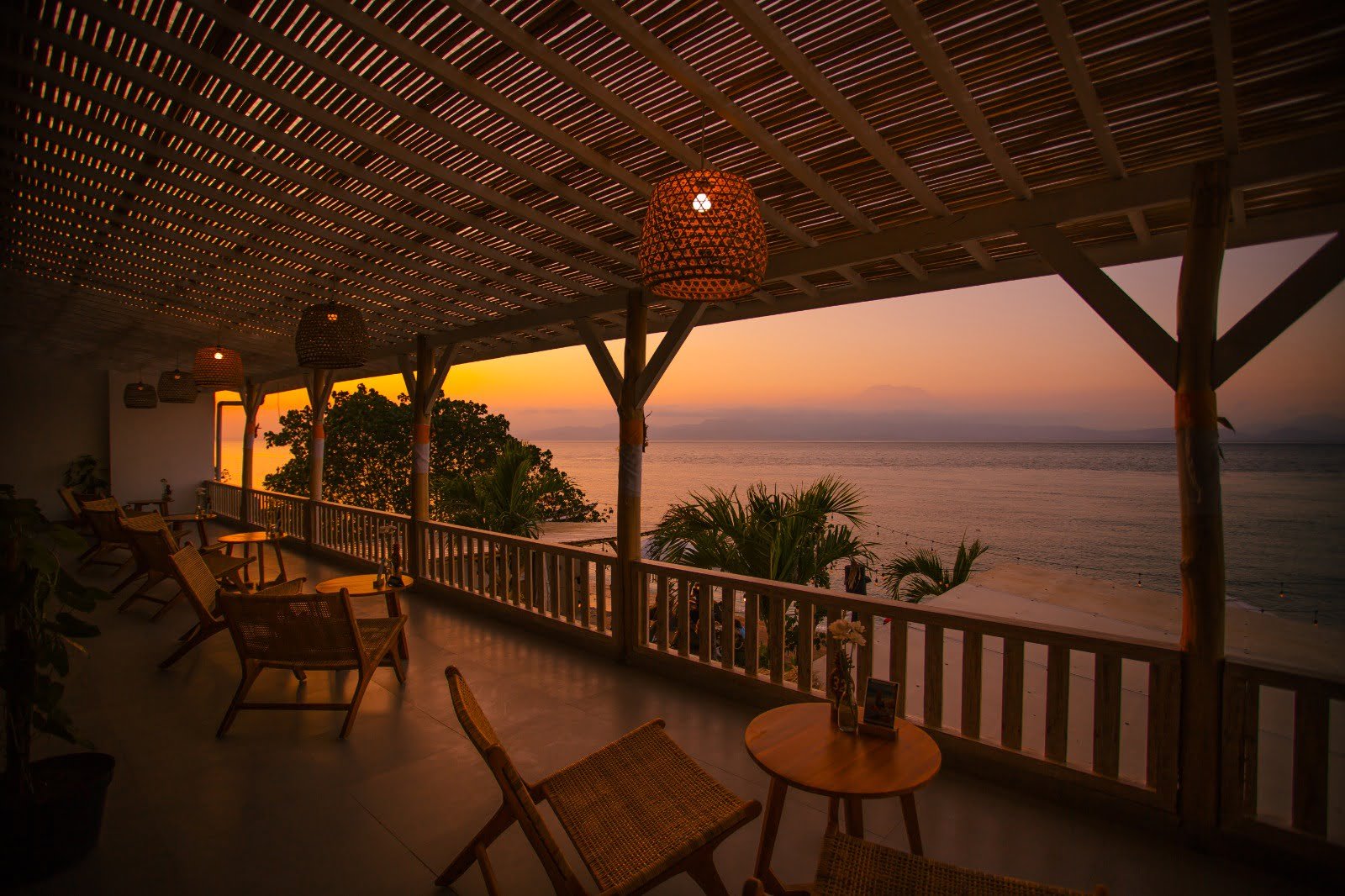 Penida Colada Beach Bar — Terrace under the evening sky