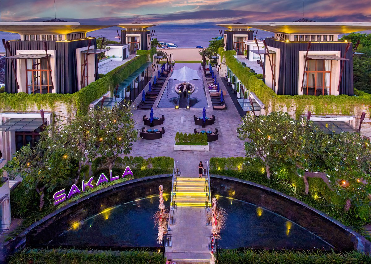Sakala Beach Club entrance and dusk pool view