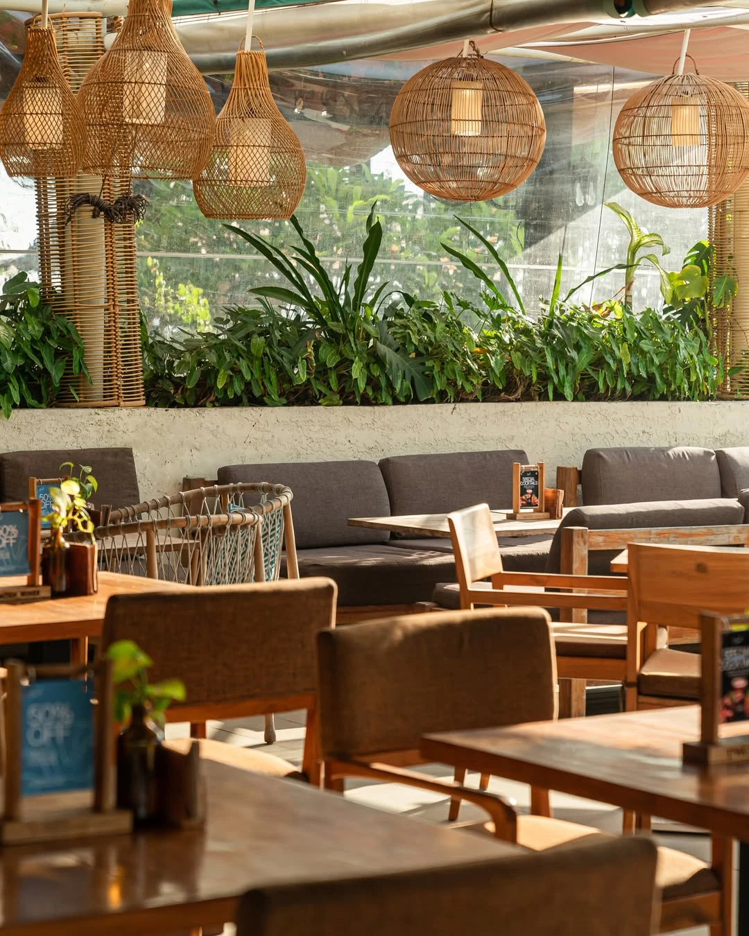 Sand Beach Bar & Restaurant — Woven lights and greenery