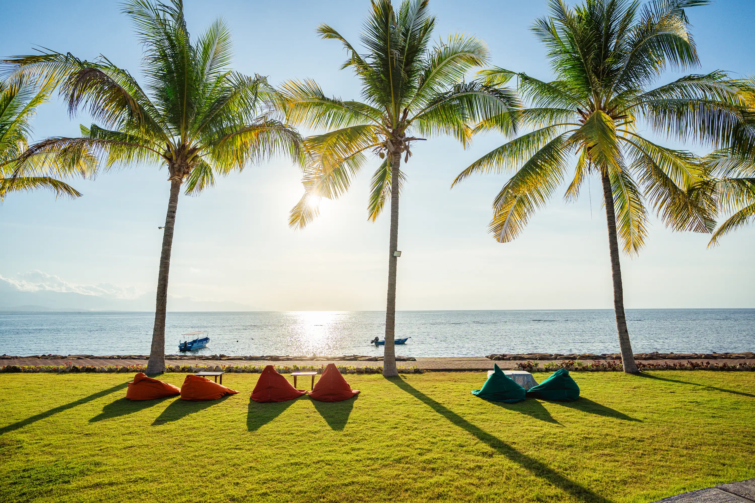 Beachfront lawn and beanbags at Sea Sky Lovina