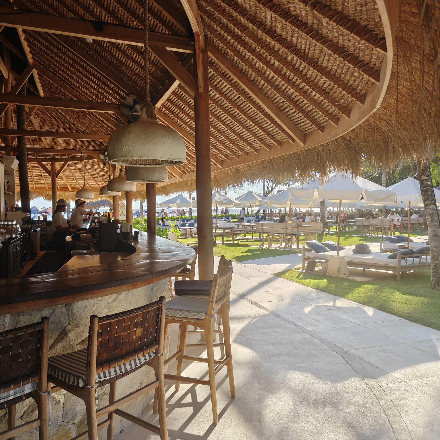 The Grill pavilion and open venue mood at Suka Sunset Beach Club