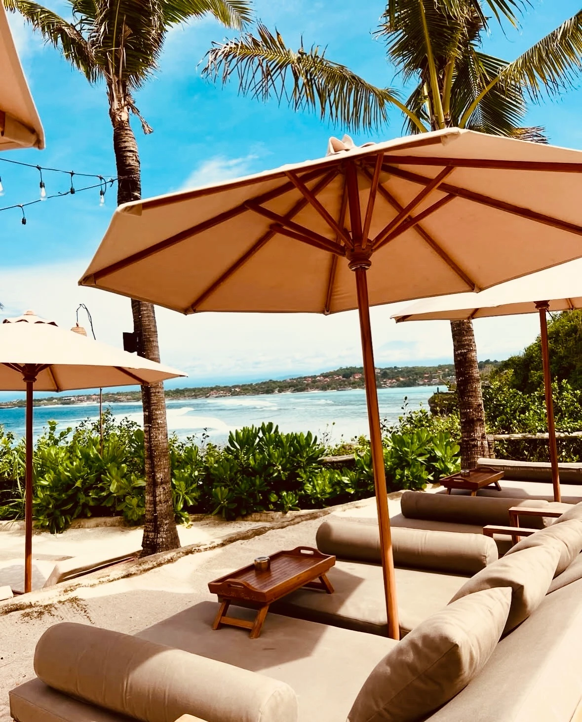 Suku Beach Club — Beds viewed towards the sea