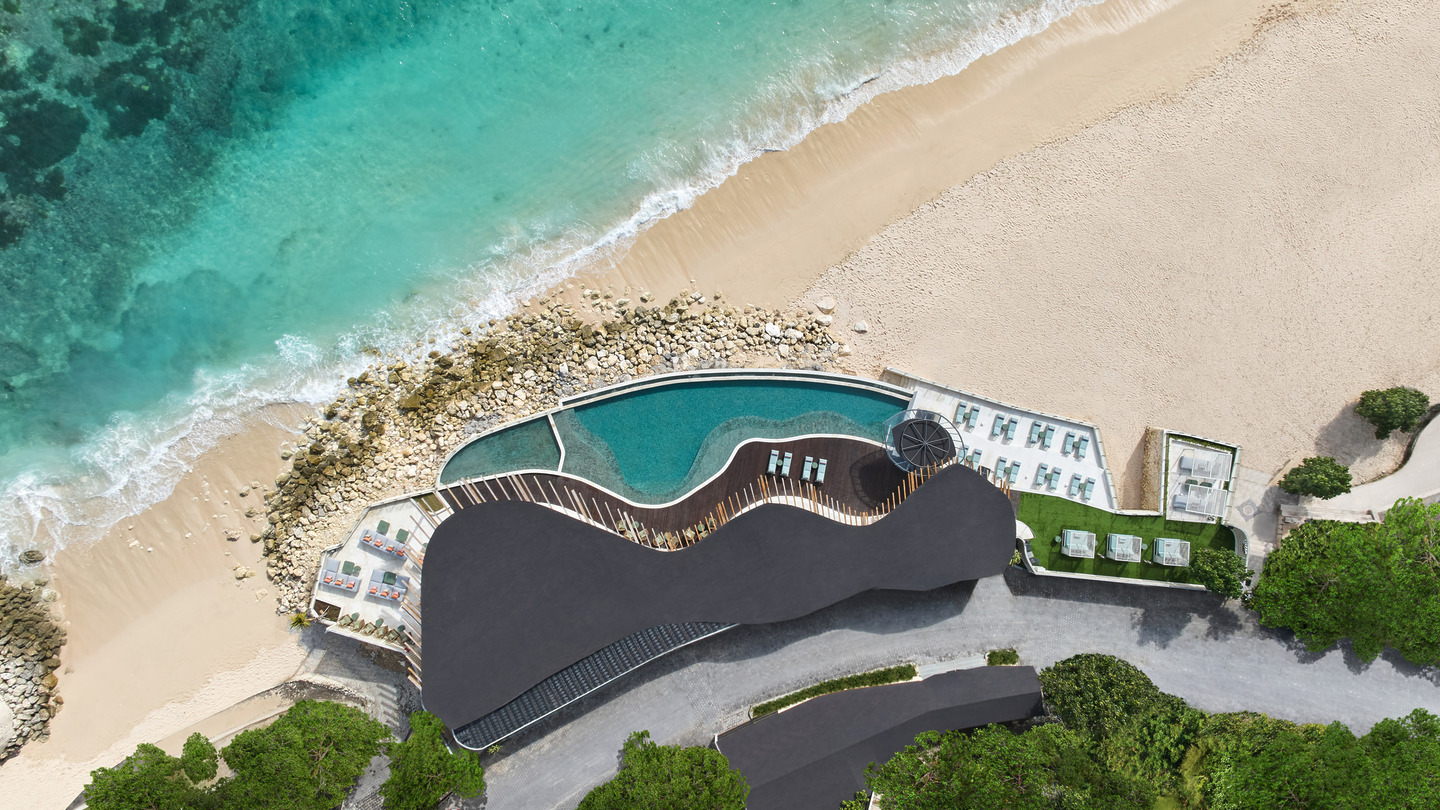 Uma Beach House pool and beach edge from above