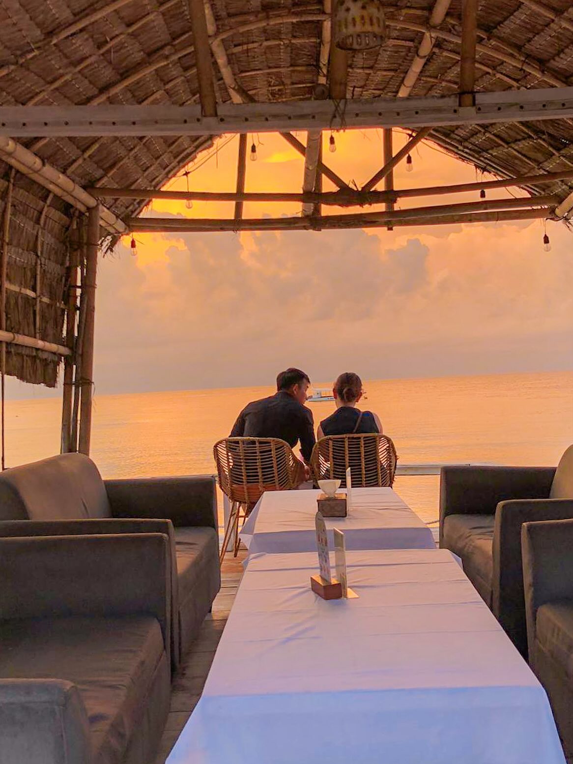 Dining area facing the evening sky