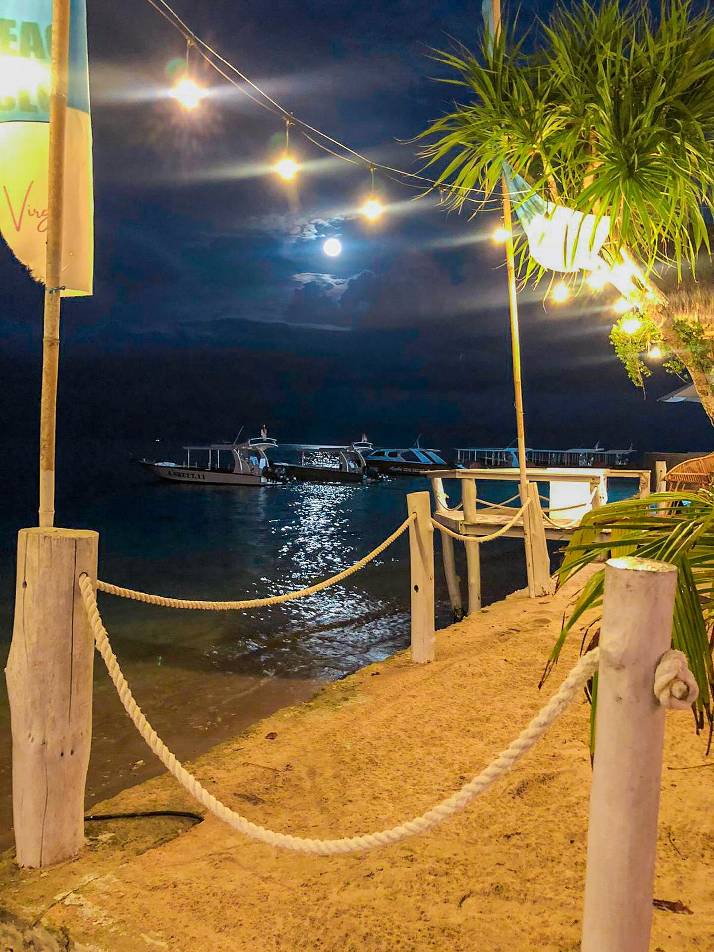 Illuminated waterfront after dark