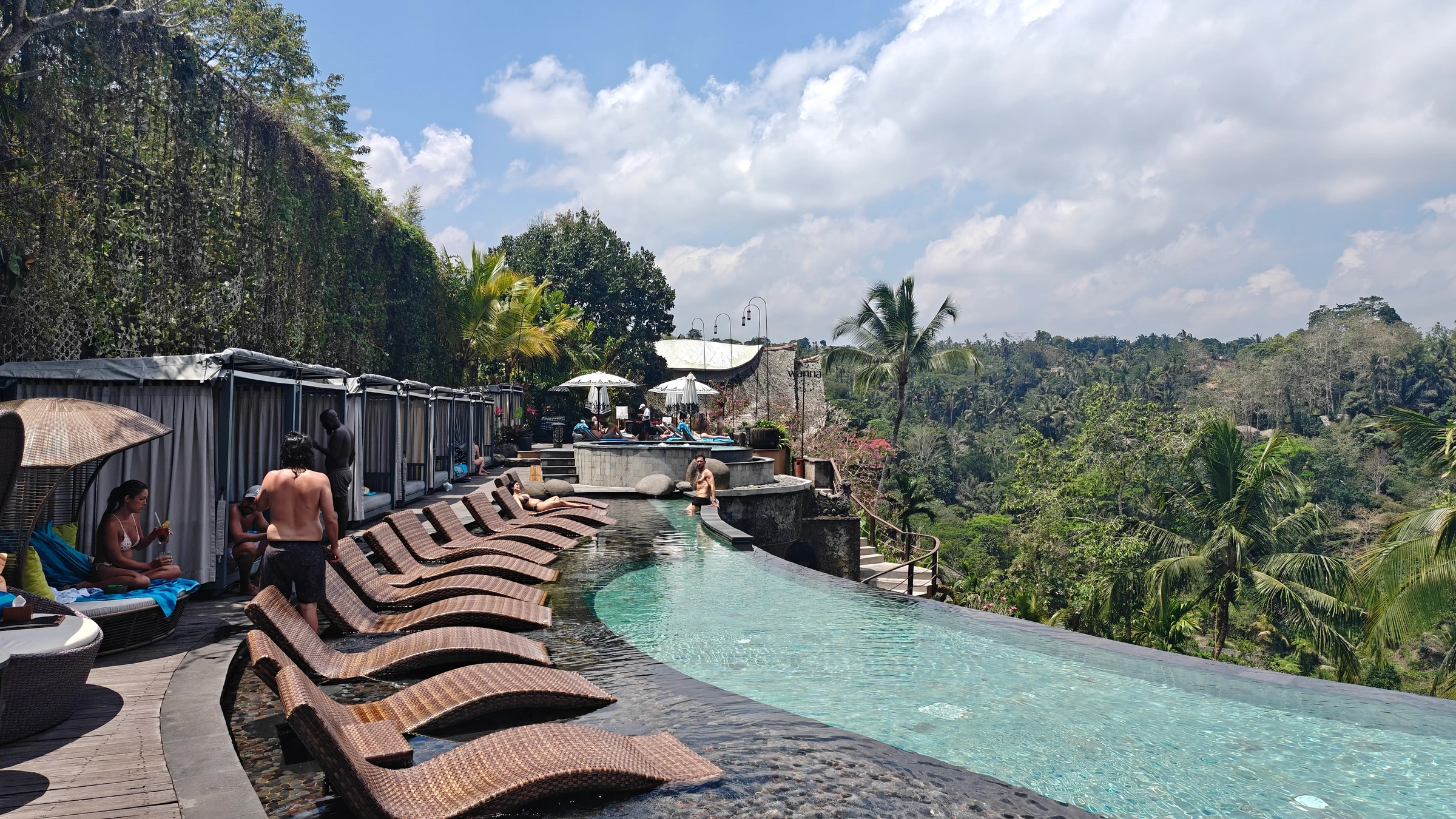 Wanna Jungle Pool & Bar — Pool deck with loungers