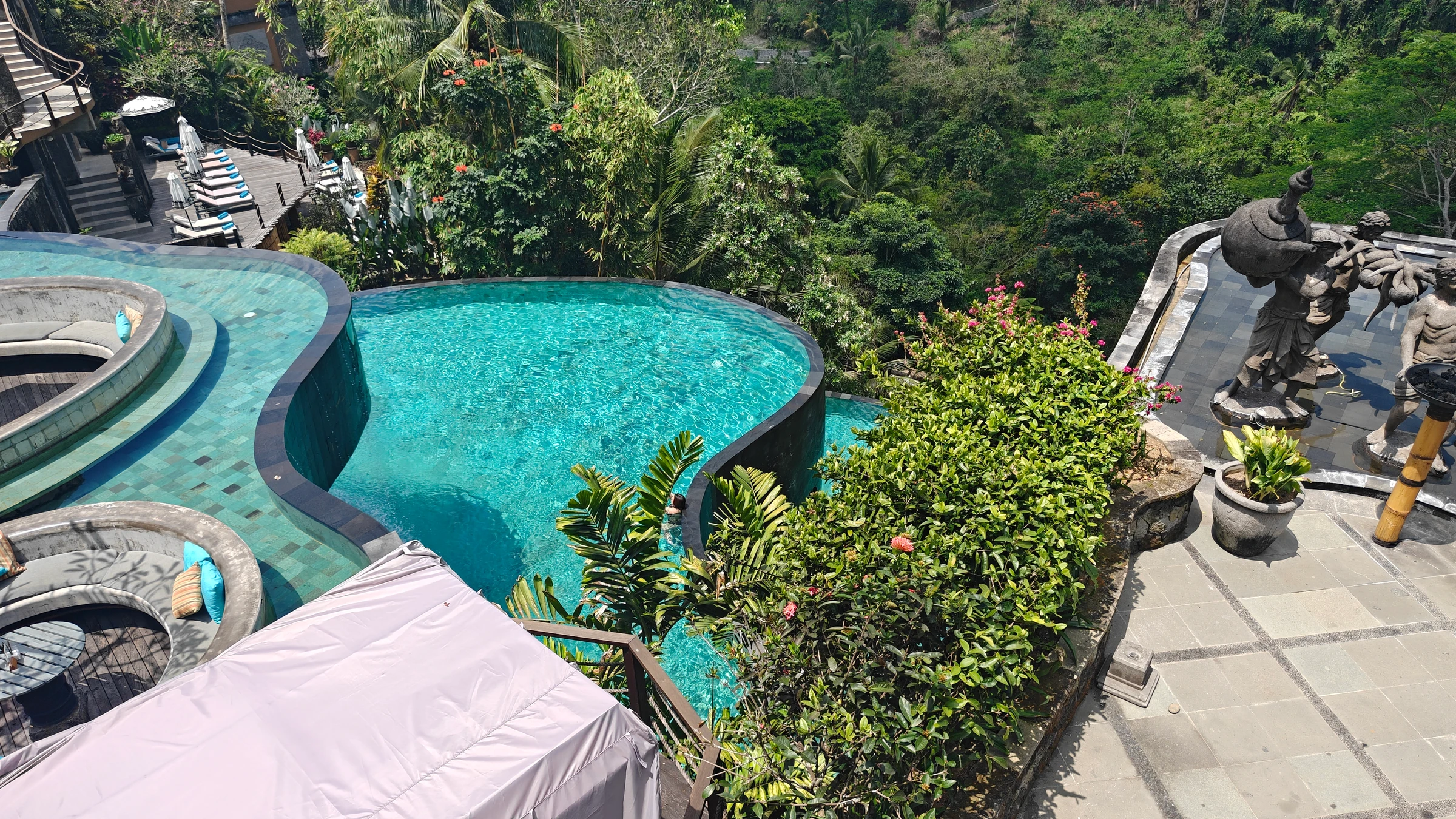 Statue and curved pool