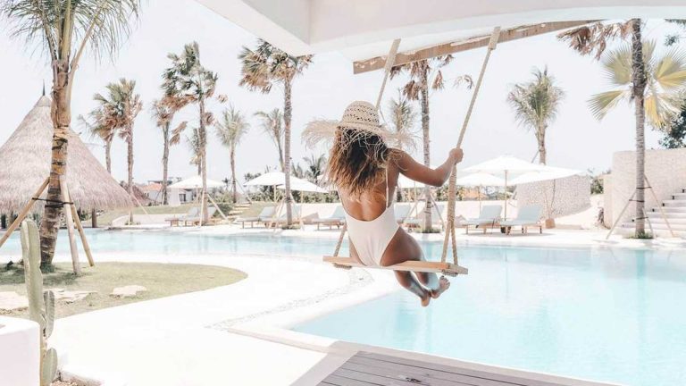 Pool, swing and palms at Alternative Beach