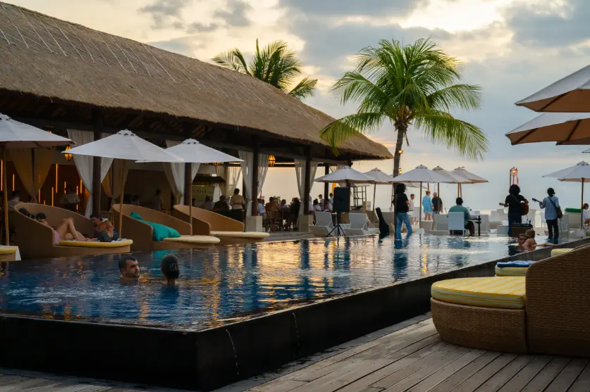 Pool and beachfront pavilion at sunset at Lembongan Beach Club & Resort
