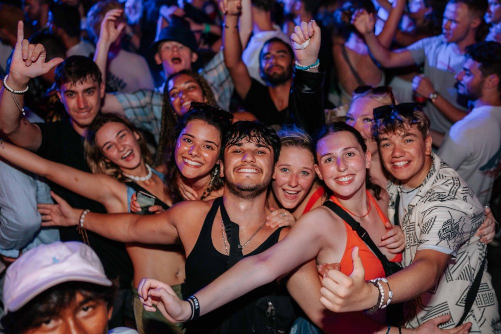 Smiling guests posing during a party at Old Man’s
