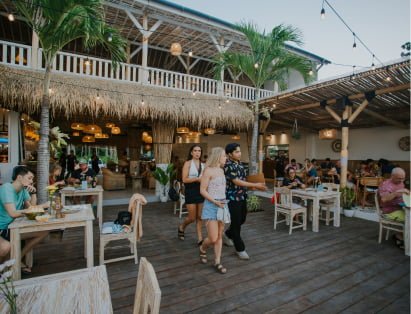 Open-air restaurant and timber deck at Penida Colada
