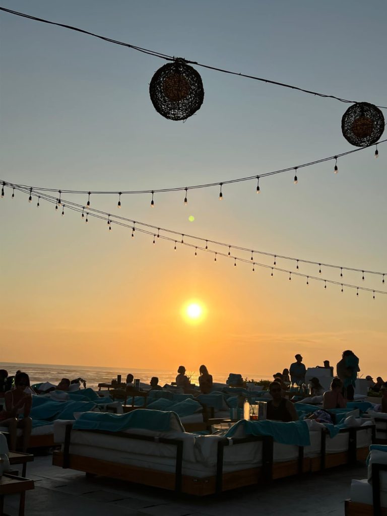 Sunset-facing view that shows the stronger beach-side mood.