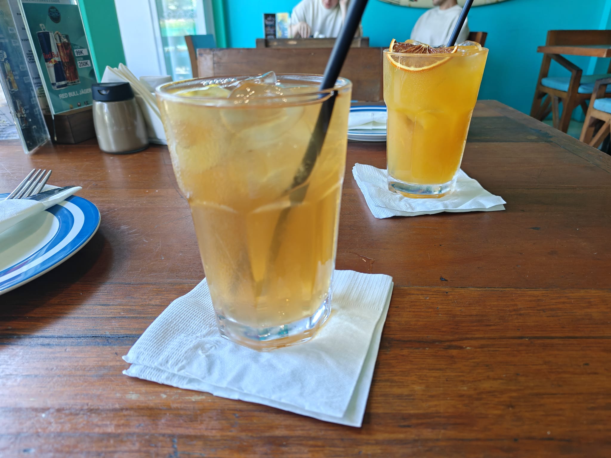 Pavilion Surf Club drinks on a wooden table