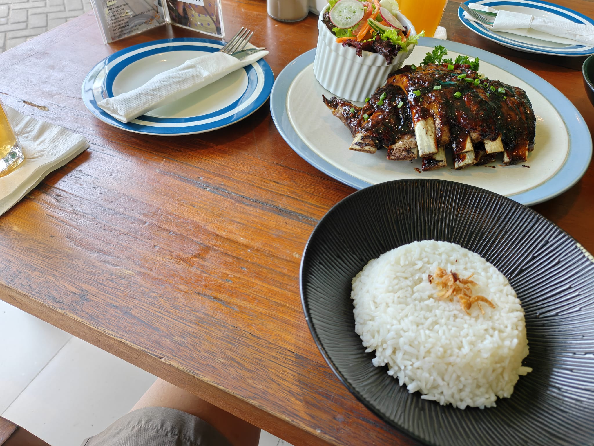 Pavilion Surf Club ribs with rice and salad
