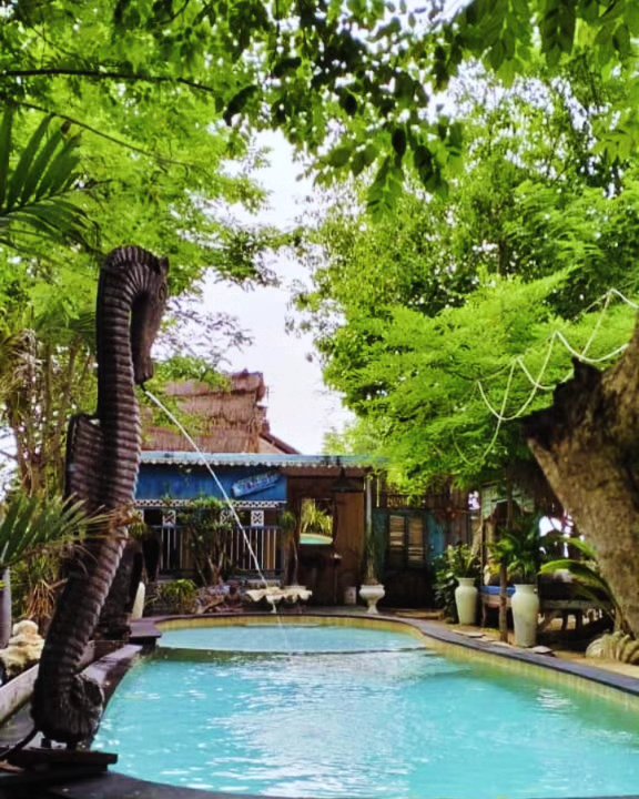 Small green-framed pool at Agung Beach Club