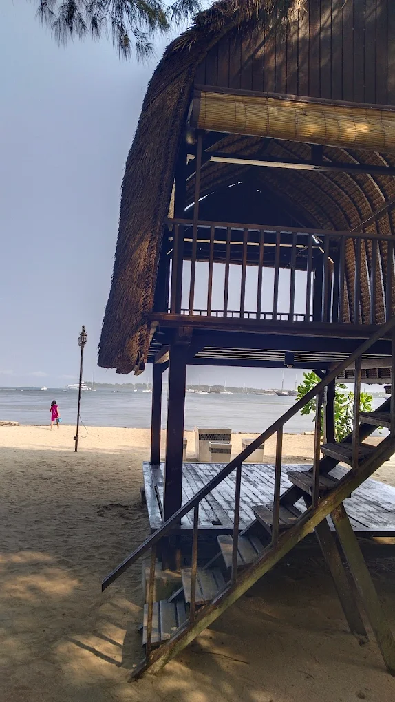 Wooden entrance and deck area at Dream Island Bali Beach Club