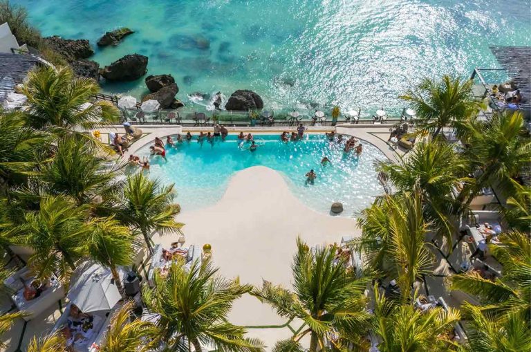 Aerial view of the clifftop pool and ocean at El Kabron Bali