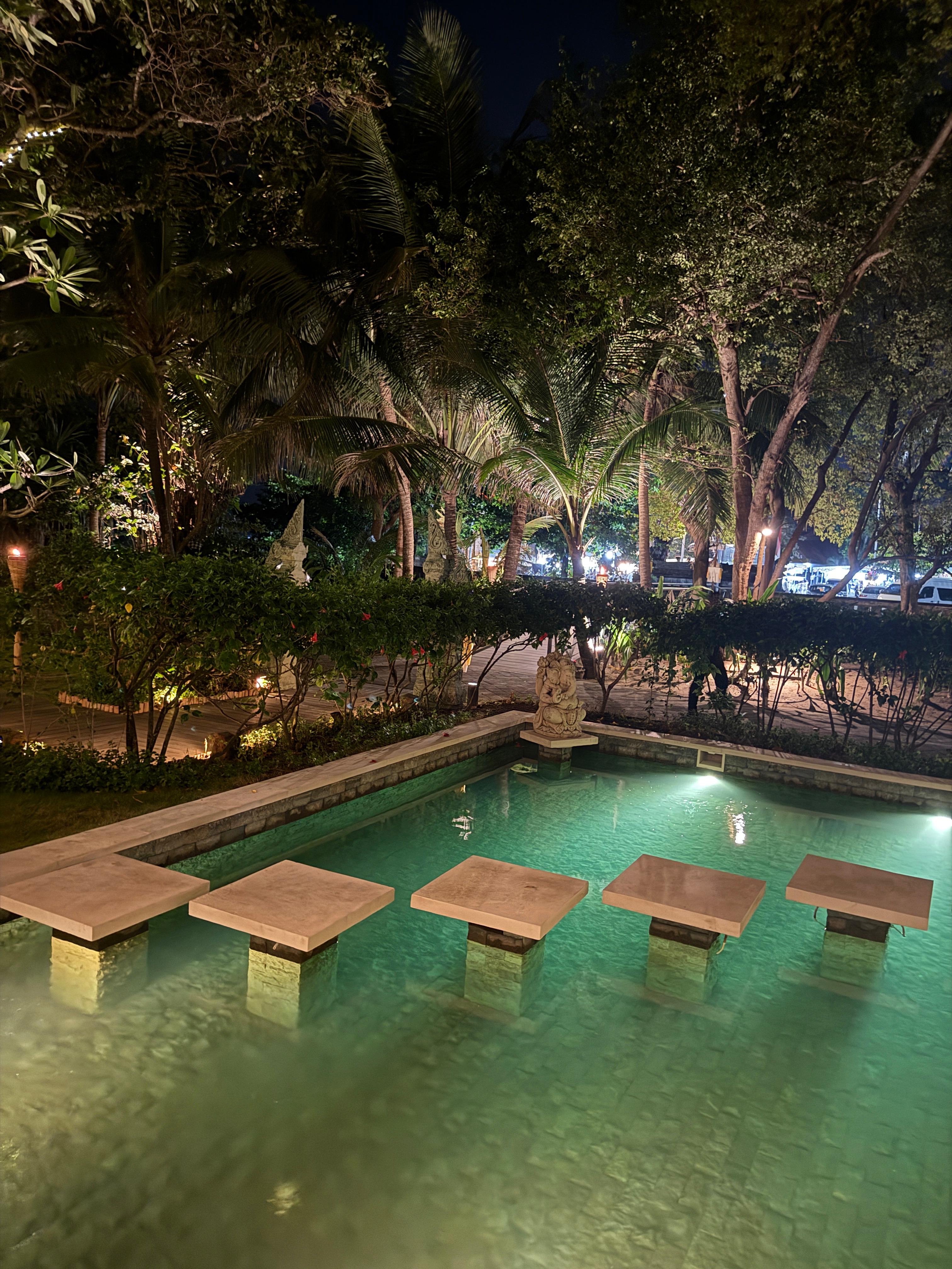 Decorative water feature in the garden at night
